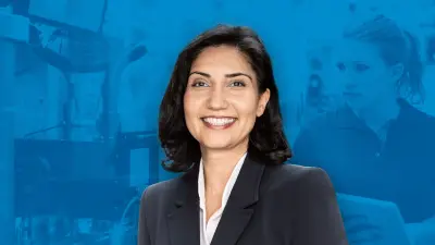 Bosch-Geschäftsführerin Filiz Albrecht vor blauem Hintergrund